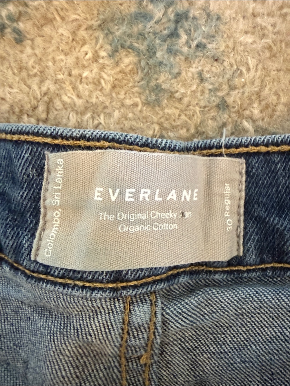 Everlane dark blue high-rise jeans with gold hardware